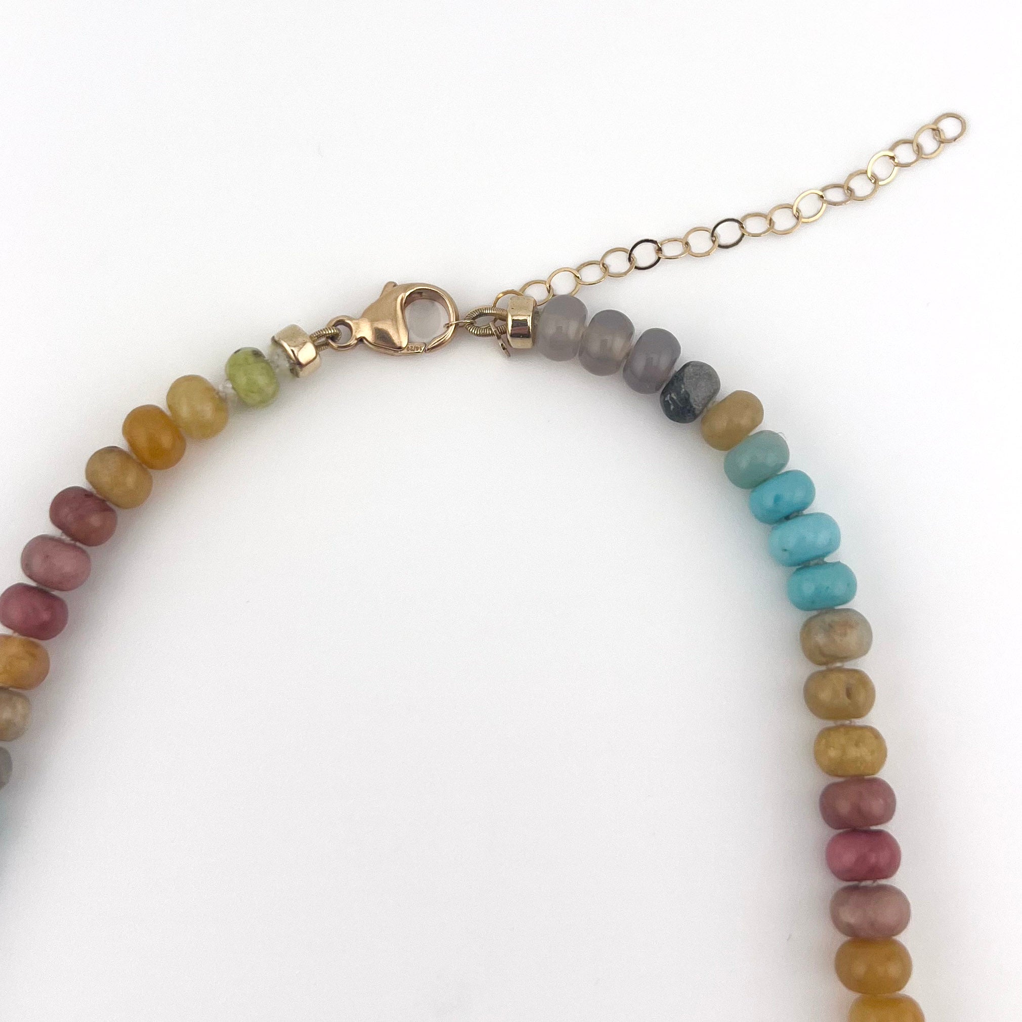 Multicolored beaded bracelet on a white background